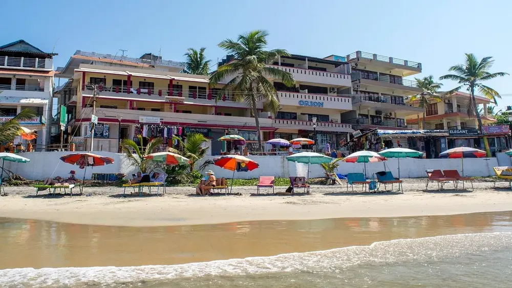 Orion Seaview Beach Hotel building exterior facing the sandy shoreline of Lighthouse Beach in Kovalam Kerala