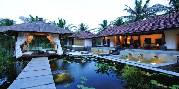 Traditional Kerala heritage cottages and luxury accommodations at Niraamaya Retreats Surya Samudra Kovalam
