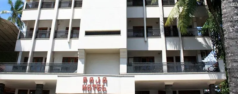 Affordable hotel rooms with private balconies at Raja Hotel near Lighthouse Beach Kovalam