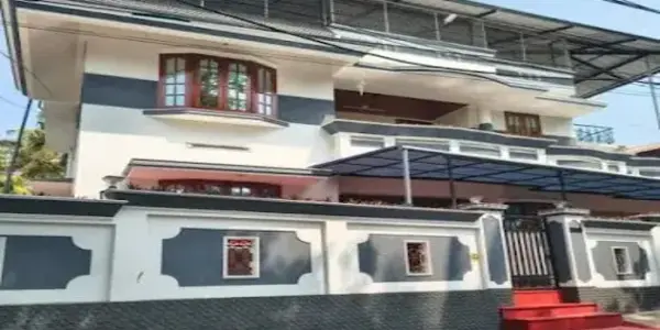 Premium boutique homestay villa exterior with gated compound at Therickal Homes Homesta