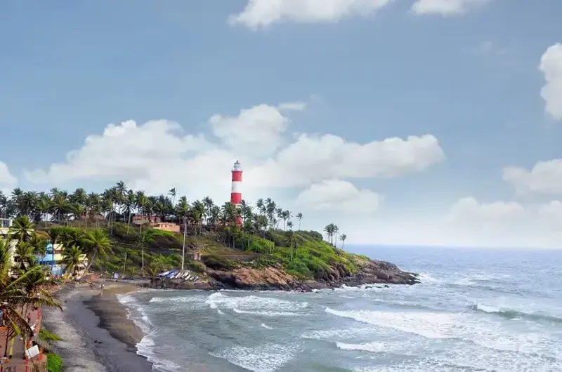 Scenic view of the Kovalam lighthouse and shoreline from Hawah Beach Resort