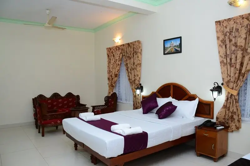 Comfortable double bedroom accommodation with clean linen at Hawah Beach Resort Kovalam