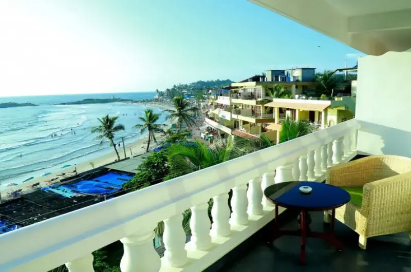 Private resort balcony offering panoramic sea views at Little Elephant Beach Resort Kovalam