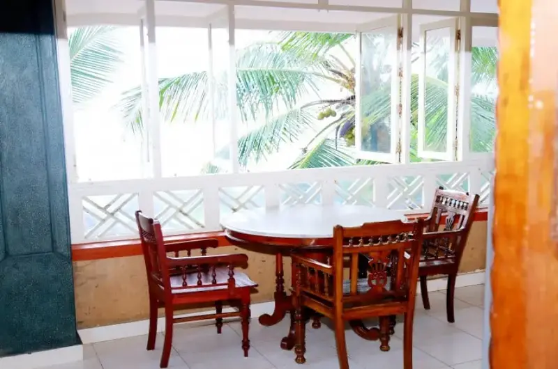 In house open air restaurant dining setup with a view at Little Elephant Beach Resort Kovalam