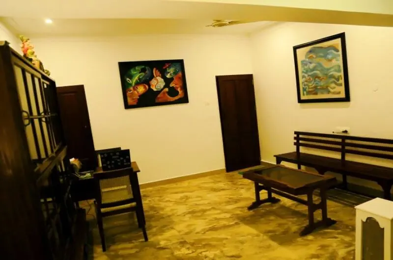 Comfortable indoor guest lounge and sitting area at Little Elephant Beach Resort Kovalam