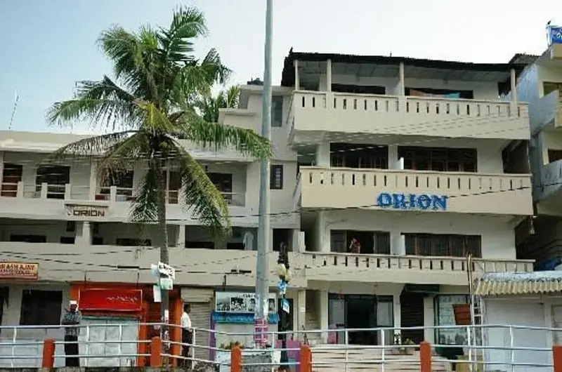 Multi story resort building facade with balconies at Orion Seaview Beach Resort