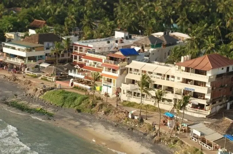 Scenic coastal resort view overlooking the beach at Orion Seaview Beach Resort Kovalam