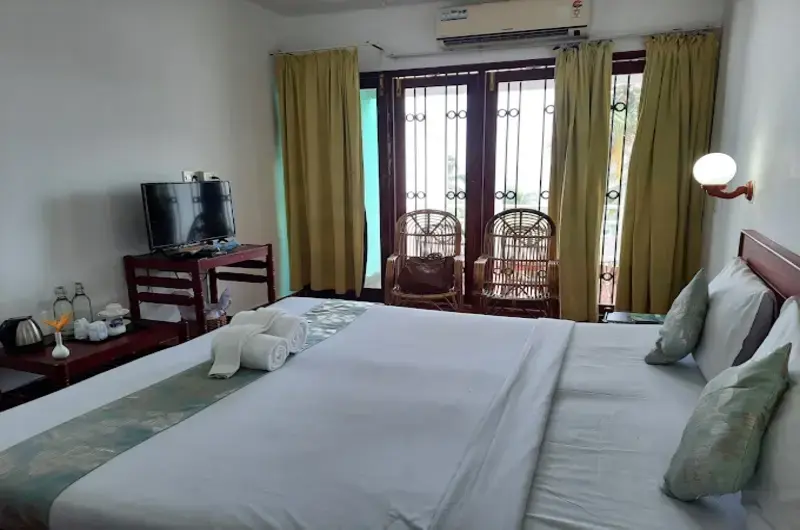 Premium sea facing guest room layout with modern amenities at Soma Palmshore Beach Resort Kovalam