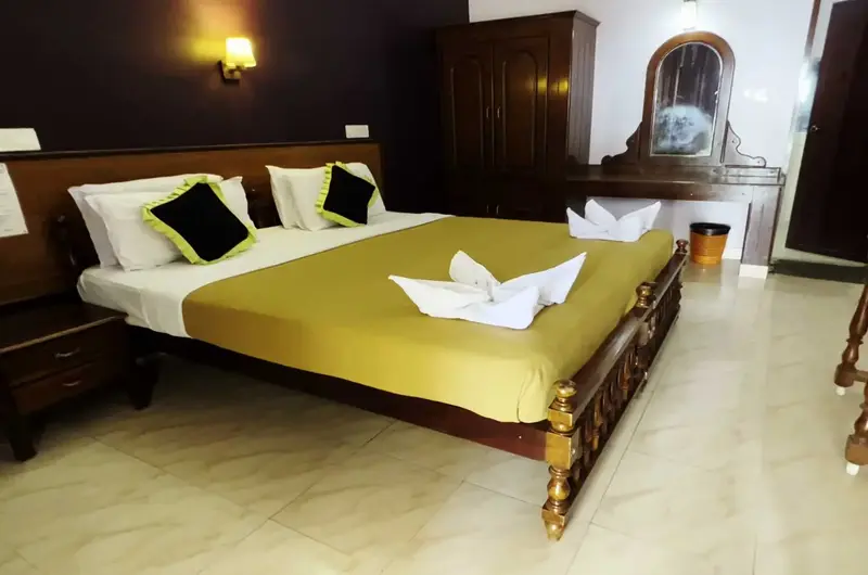 Premium double room accommodation with modern amenities at Pappukutty Beach Resort