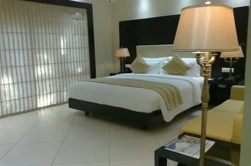 Luxury floating cottage bedroom layout overlooking the serene backwaters at Poovar Island Resort