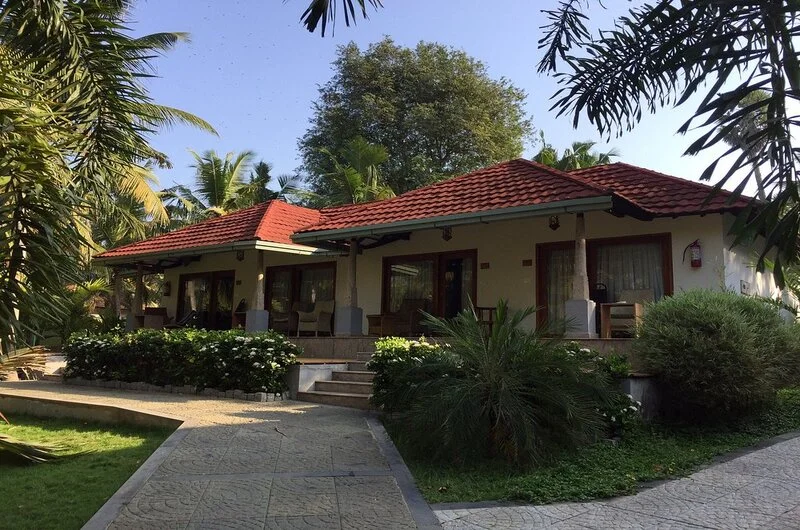 Beautifully landscaped gardens and premium land cottages at Poovar Island Resort