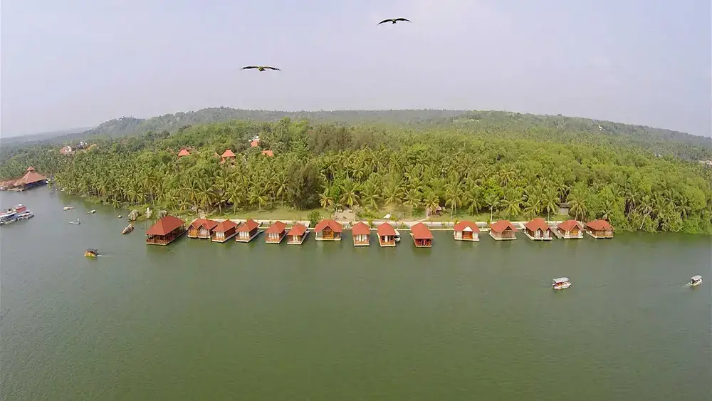 Aerial view of Poovar Island Resort surrounded by scenic backwaters and mangroves