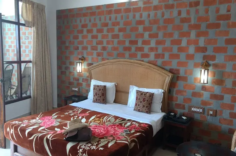 Comfortable AC resort accommodation with contemporary wooden furnishings at Sagara Beach Resort