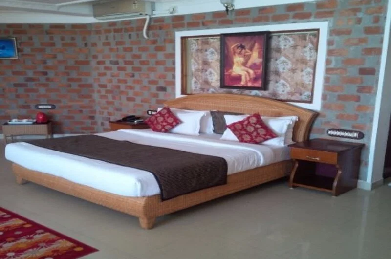 Spacious deluxe bedroom featuring modern interior design at Sagara Beach Resort