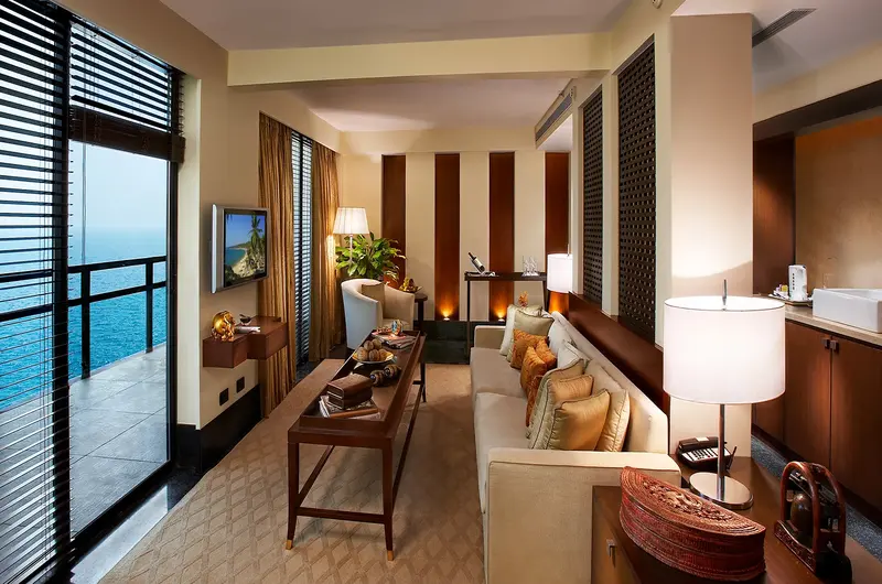 Luxury presidential suite living room with sea view balcony at The Leela Kovalam