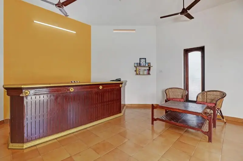 Hotel reception desk and guest lobby area at Treebo Trend Linchu Ayur Resort Kovalam