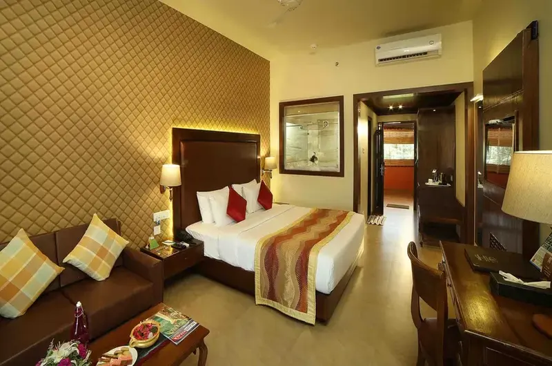 Deluxe twin bedroom accommodation with premium modern interiors at Uday Samudra Beach Hotel.