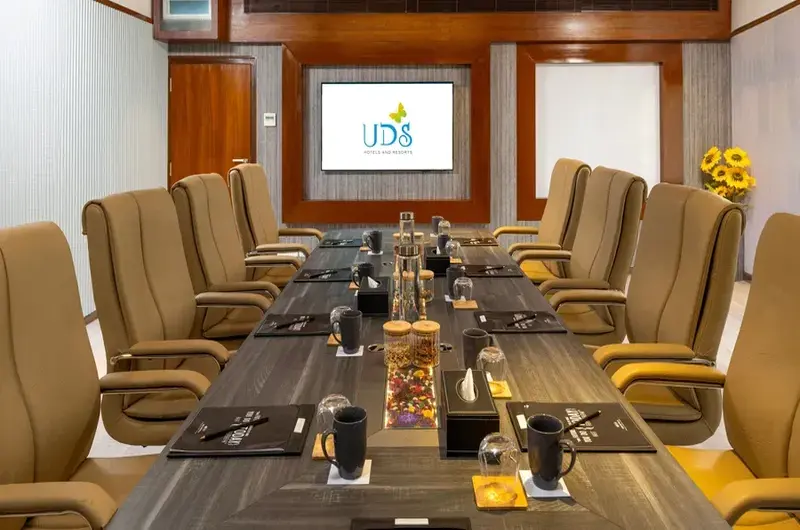 Premium executive boardroom and corporate meeting table setup at Uday Samudra Leisure Beach Hotel Kovalam.