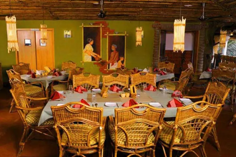 Spacious family dining room at the multi-cuisine restaurant inside La Promenade Hotel Kovalam.
