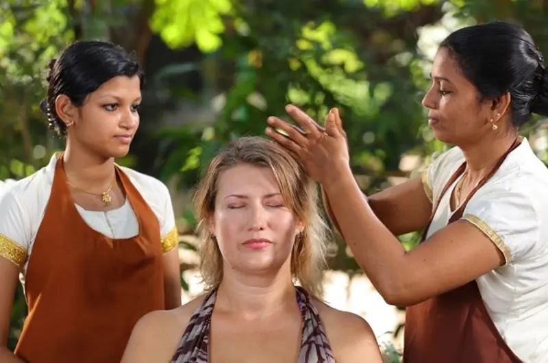 Authentic Ayurvedic head massage treatment by experienced therapists at Soma Manaltheeram Ayurvedic Hospital & Research Centre Kovalam