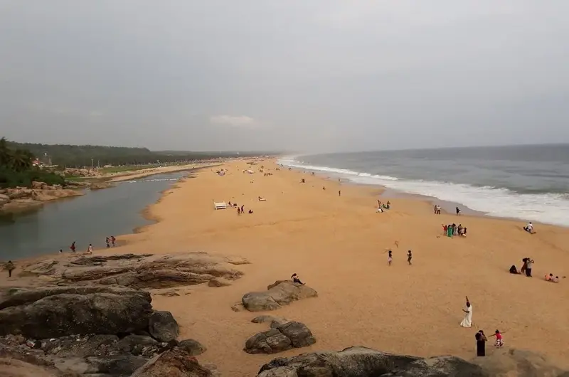 Panoramic view of the sandy beach and Arabian Sea coastline at Soma Manaltheeram Ayurvedic Hospital & Research Centre Kovalam