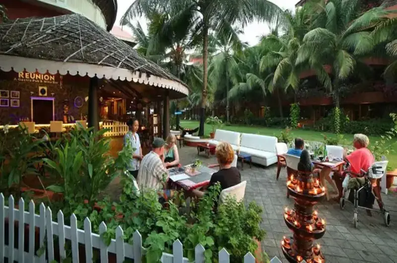 Beautiful outdoor garden restaurant and open-air dining space at Uday Samudra Leisure Beach Hotel.