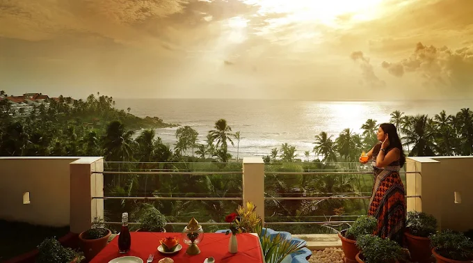 Scenic ocean sunset view from the balcony terrace of Samudratheeram Beach Resort Kovalam.