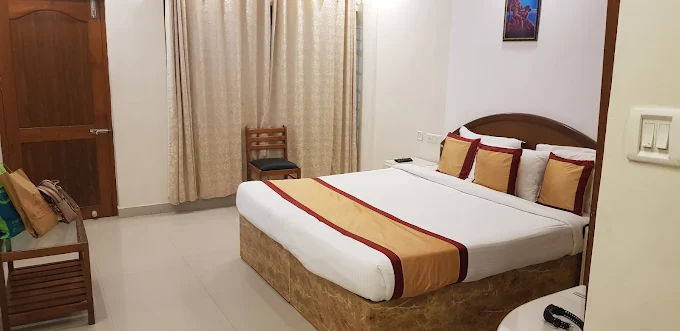 Deluxe double room interior at Samudratheeram Beach Resort Kovalam with modern furnishings.