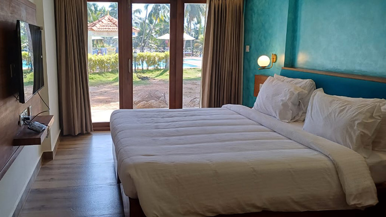 Spacious twin bedroom accommodation with ocean views at Samudra KTDC Kovalam