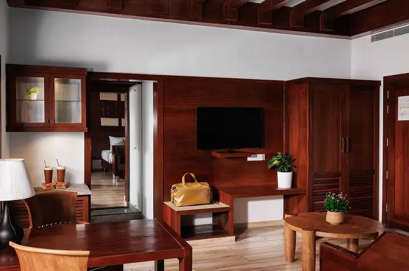 Premium signature suite bedroom featuring contemporary design at Gokulam Grand Turtle on the Beach Kovalam
