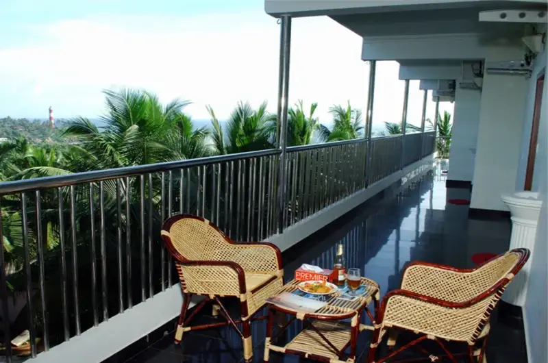 Hotel Rock N Beach balcony sitting area with scenic outdoor view Kovalam