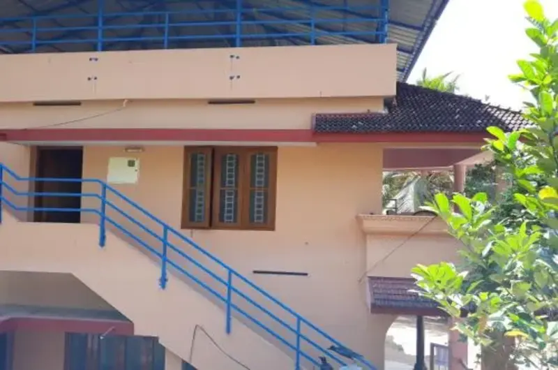 Exterior architecture and outdoor staircase of Padmini House in Kovalam Kerala
