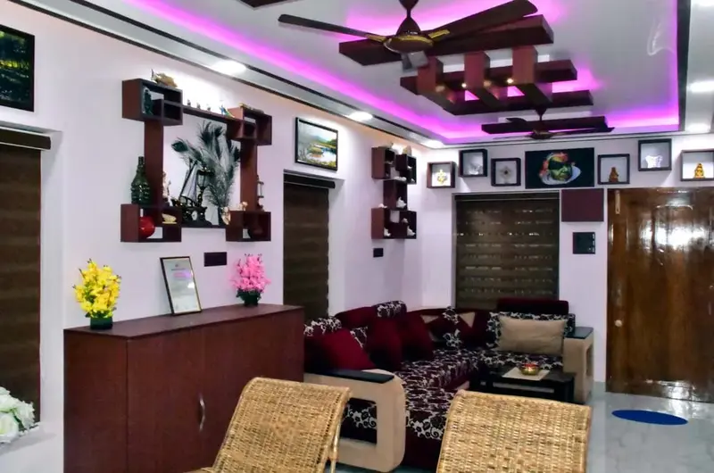 Spacious communal lounge with comfortable seating and festive decorations