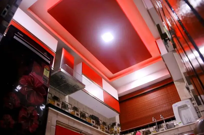 Cozy bedroom interior showcasing warm recessed ceiling lights at Mary Land Homestay
