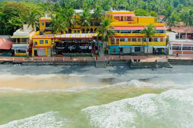 Aerial view of Jeevan Beach Resort beachfront property overlooking the Kovalam coastline and sea